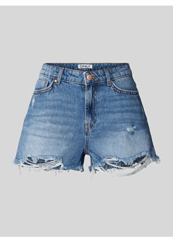 Szorty jeansowe o kroju regular fit z przetarciami model ‘JACI’ ze sklepu Peek&Cloppenburg  w kategorii Szorty - zdjęcie 173872455