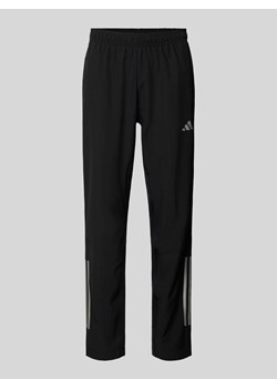 Spodnie treningowe o kroju regular fit z kieszeniami zapinanymi na zamek błyskawiczny ze sklepu Peek&Cloppenburg  w kategorii Spodnie męskie - zdjęcie 173878259