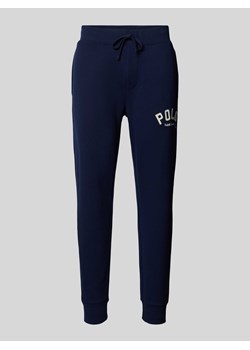 Spodnie dresowe z elastycznym pasem ze sklepu Peek&Cloppenburg  w kategorii Spodnie męskie - zdjęcie 173878476