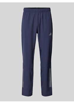 Spodnie treningowe o kroju regular fit z kieszeniami zapinanymi na zamek błyskawiczny ze sklepu Peek&Cloppenburg  w kategorii Spodnie męskie - zdjęcie 173878716
