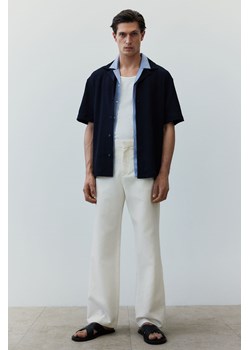 H & M - Rozszerzane spodnie z domieszką lnu Regular Fit - Biały ze sklepu H&M w kategorii Spodnie męskie - zdjęcie 173879099