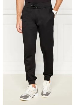 GUESS ACTIVE Spodnie dresowe SHEEN CUFFED | Regular Fit ze sklepu Gomez Fashion Store w kategorii Spodnie męskie - zdjęcie 173964867