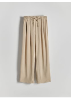 Reserved - Spodnie z wiskozy - beżowy ze sklepu Reserved w kategorii Spodnie damskie - zdjęcie 173974068