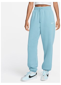 Damskie spodnie dresowe o kroju oversize z wysokim stanem Nike Sportswear Phoenix Fleece - Niebieski ze sklepu Nike poland w kategorii Spodnie damskie - zdjęcie 174000846