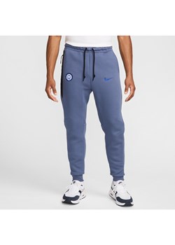 Męskie joggery piłkarskie Nike Inter Mediolan Tech Fleece - Niebieski ze sklepu Nike poland w kategorii Spodnie męskie - zdjęcie 174019678