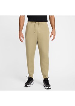 Męskie spodnie z dzianiny Nike Tech - Brązowy ze sklepu Nike poland w kategorii Spodnie męskie - zdjęcie 174019795