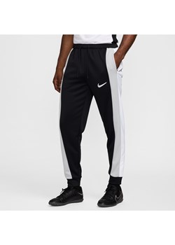 Męskie dresowe spodnie piłkarskie Dri-FIT Nike Academy - Czerń ze sklepu Nike poland w kategorii Spodnie męskie - zdjęcie 174087805