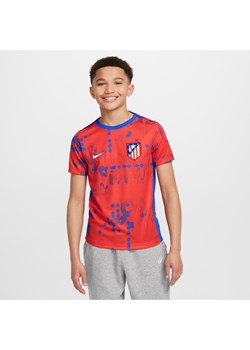 Przedmeczowa koszulka piłkarska z krótkim rękawem dla dużych dzieci Nike Dri-FIT Atlético Madryt Academy Pro - Czerwony ze sklepu Nike poland w kategorii T-shirty chłopięce - zdjęcie 174117836