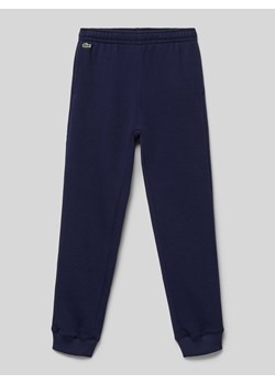Spodnie dresowe z elastycznym ściągaczem ze sklepu Peek&Cloppenburg  w kategorii Spodnie chłopięce - zdjęcie 174128305