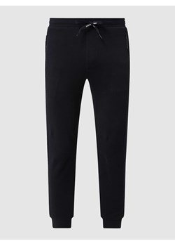 Spodnie dresowe z detalem z logo model ‘Milano’ ze sklepu Peek&Cloppenburg  w kategorii Spodnie męskie - zdjęcie 174131878