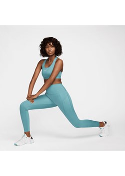 Damskie legginsy o pełnej długości z wysokim stanem i kieszeniami zapewniające mocne wsparcie Nike Go - Niebieski ze sklepu Nike poland w kategorii Spodnie damskie - zdjęcie 174148569