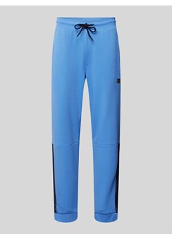 Spodnie dresowe z nadrukiem z logo model ‘NATURAL’ ze sklepu Peek&Cloppenburg  w kategorii Spodnie męskie - zdjęcie 174161885