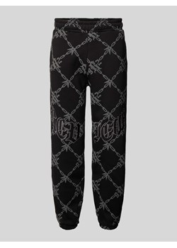 Spodnie dresowe o kroju regular fit z naszywkami z logo ze sklepu Peek&Cloppenburg  w kategorii Spodnie męskie - zdjęcie 174170659