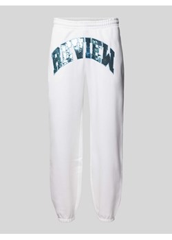 Spodnie dresowe o kroju regular fit z cekinowym obszyciem ze sklepu Peek&Cloppenburg  w kategorii Spodnie męskie - zdjęcie 174170876