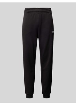 Spodnie dresowe o kroju regular fit z nadrukiem z logo ze sklepu Peek&Cloppenburg  w kategorii Spodnie męskie - zdjęcie 174371418