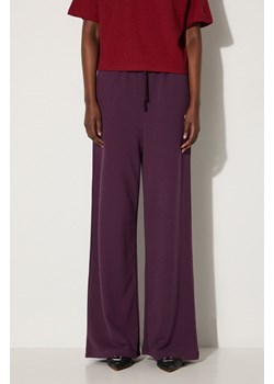 Puma spodnie dresowe bawełniane BETTER CLASSIC kolor fioletowy gładkie 624235 ze sklepu PRM w kategorii Spodnie damskie - zdjęcie 174538585