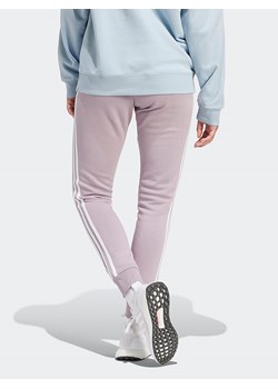 adidas Spodnie dresowe w kolorze fioletowym ze sklepu Limango Polska w kategorii Spodnie damskie - zdjęcie 174550595