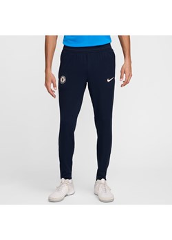 Męskie spodnie piłkarskie z dzianiny Nike Dri-FIT ADV Chelsea F.C. Strike Elite - Niebieski ze sklepu Nike poland w kategorii Spodnie męskie - zdjęcie 174557298