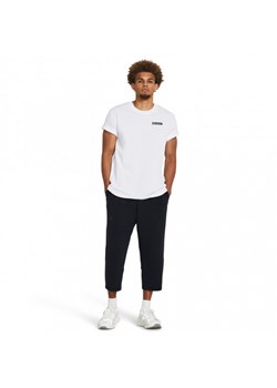 Męskie spodnie treningowe Under Armour Unstoppable Flc Baggy Crop - czarne ze sklepu Sportstylestory.com w kategorii Spodnie męskie - zdjęcie 174687315