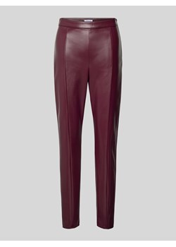 Spodnie o kroju skinny fit z imitacji skóry ze sklepu Peek&Cloppenburg  w kategorii Spodnie damskie - zdjęcie 174689598