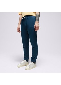 ELLESSE SPODNIE COPERCHIATA JOG PANT DBLUE ze sklepu Sizeer w kategorii Spodnie męskie - zdjęcie 174756905