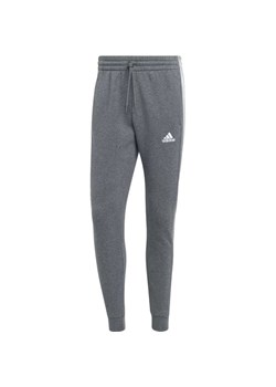 Spodnie dresowe męskie Essentials Fleece 3-Stripes Tapered Cuff Adidas ze sklepu SPORT-SHOP.pl w kategorii Spodnie męskie - zdjęcie 174961788