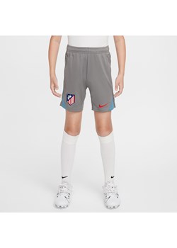 Dzianinowe spodenki piłkarskie dla dużych dzieci Nike Dri-FIT Atlético Madryt Strike - Szary ze sklepu Nike poland w kategorii Spodenki chłopięce - zdjęcie 175097789