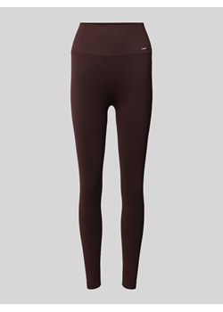 Legginsy sportowe z elastycznym pasem i detalem z logo ze sklepu Peek&Cloppenburg  w kategorii Spodnie damskie - zdjęcie 175146318