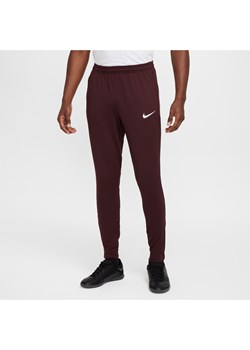 Męskie spodnie piłkarskie Dri-FIT Nike Strike - Czerwony ze sklepu Nike poland w kategorii Spodnie męskie - zdjęcie 175564937