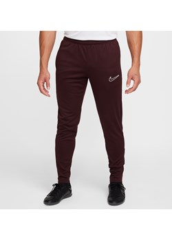 Męskie spodnie piłkarskie Dri-FIT Nike Academy - Czerwony ze sklepu Nike poland w kategorii Spodnie męskie - zdjęcie 175564997