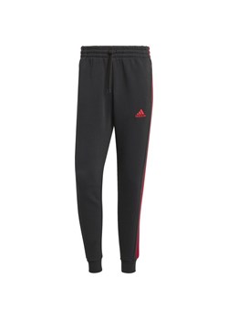 Spodnie dresowe męskie Essentials Fleece 3-Stripes Tapered Cuff Adidas ze sklepu SPORT-SHOP.pl w kategorii Spodnie męskie - zdjęcie 175737099