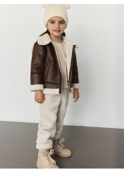 Reserved - Spodnie z imitacji baranka - beżowy ze sklepu Reserved w kategorii Spodnie dziewczęce - zdjęcie 175947517