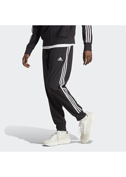 Spodnie dresowe męskie adidas AEROREADY Essentials Tapered Cuff Woven 3-Stripes ze sklepu Decathlon w kategorii Spodnie męskie - zdjęcie 176105528