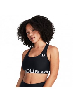 Biustonosz treningowy Under Armour UA HG Mid Branded - czarny ze sklepu Sportstylestory.com w kategorii Biustonosze - zdjęcie 176258547