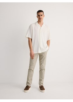 Reserved - Spodnie chino slim fit - jasnozielony ze sklepu Reserved w kategorii Spodnie męskie - zdjęcie 176289288