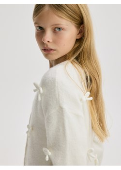 Reserved - Kardigan z kokardami - złamana biel ze sklepu Reserved w kategorii Swetry dziewczęce - zdjęcie 176598569