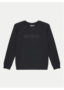 Guess Bluza L4BQ31 KAIJ1 Czarny Regular Fit ze sklepu MODIVO w kategorii Bluzy chłopięce - zdjęcie 176615657