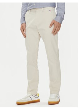 Tommy Jeans Chinosy Austin DM0DM19486 Beżowy Slim Fit - id: 0000303858704 - marki Tommy Jeans - 176666595 Tommy Jeans Chinosy Austin DM0DM19486 Beżowy Slim Fit ze sklepu MODIVO w kategorii Spodnie męskie - zdjęcie 176666595