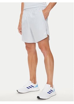 adidas Szorty sportowe Run It IN0092 Błękitny Regular Fit ze sklepu MODIVO w kategorii Spodenki męskie - zdjęcie 176711919