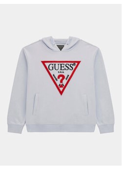 Guess Bluza L4RQ23 KAD74 Błękitny Regular Fit ze sklepu MODIVO w kategorii Bluzy chłopięce - zdjęcie 176766679