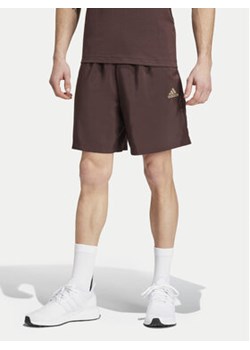 adidas Szorty sportowe AEROREADY Essentials Chelsea Small Logo IW7697 Brązowy Regular Fit ze sklepu MODIVO w kategorii Spodenki męskie - zdjęcie 176775418