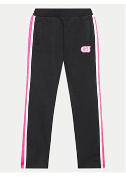 Guess Spodnie dresowe J4YQ12 KA6R4 Czarny Relaxed Fit ze sklepu MODIVO w kategorii Spodnie chłopięce - zdjęcie 176821545