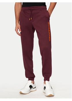 Jack&Jones Spodnie dresowe Gordon 12258477 Bordowy Regular Fit ze sklepu MODIVO w kategorii Spodnie męskie - zdjęcie 176852399