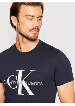 Calvin Klein Jeans T-Shirt J30J320935 Granatowy Slim Fit ze sklepu MODIVO w kategorii T-shirty męskie - zdjęcie 176875368