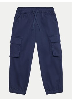 United Colors Of Benetton Joggery 4HM6GF01Z Granatowy Regular Fit ze sklepu MODIVO w kategorii Spodnie chłopięce - zdjęcie 176895068