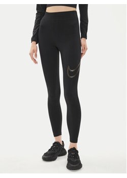 Nike Legginsy FB8766 Czarny Tight Fit ze sklepu MODIVO w kategorii Spodnie damskie - zdjęcie 176948257