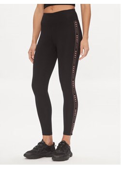 DKNY Sport Legginsy DP3P1883 Czarny Slim Fit ze sklepu MODIVO w kategorii Spodnie damskie - zdjęcie 176978458