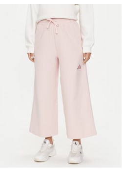 adidas Spodnie dresowe ALL SZN IY6831 Różowy Wide Leg ze sklepu MODIVO w kategorii Spodnie damskie - zdjęcie 176984927