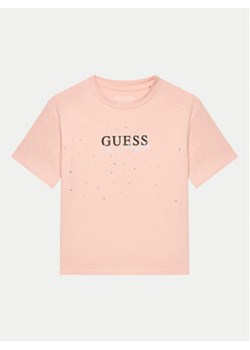 Guess T-Shirt J4YI27 K6YW4 Różowy Boxy Fit ze sklepu MODIVO w kategorii Bluzki dziewczęce - zdjęcie 177008595