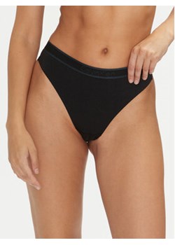 Calvin Klein Underwear Stringi 000QF7954E Czarny ze sklepu MODIVO w kategorii Majtki damskie - zdjęcie 177065895